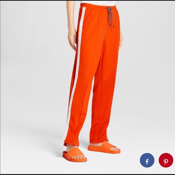 orange track pants